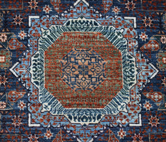 A handmade Afghan Balkh rug featuring a detailed Mamluk medallion pattern in blue, red, and green.