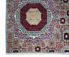 Handwoven Afghan Balkh rug featuring a detailed Mamluk medallion pattern in blue, red, and gold.