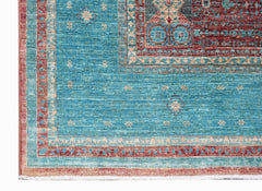 A handmade Afghan Balkh rug featuring a teal field with a detailed red Mamluk medallion pattern.