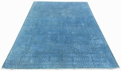 A rectangular Afghan Balkh rug featuring a monochromatic blue Mamluk pattern with a central medallion.