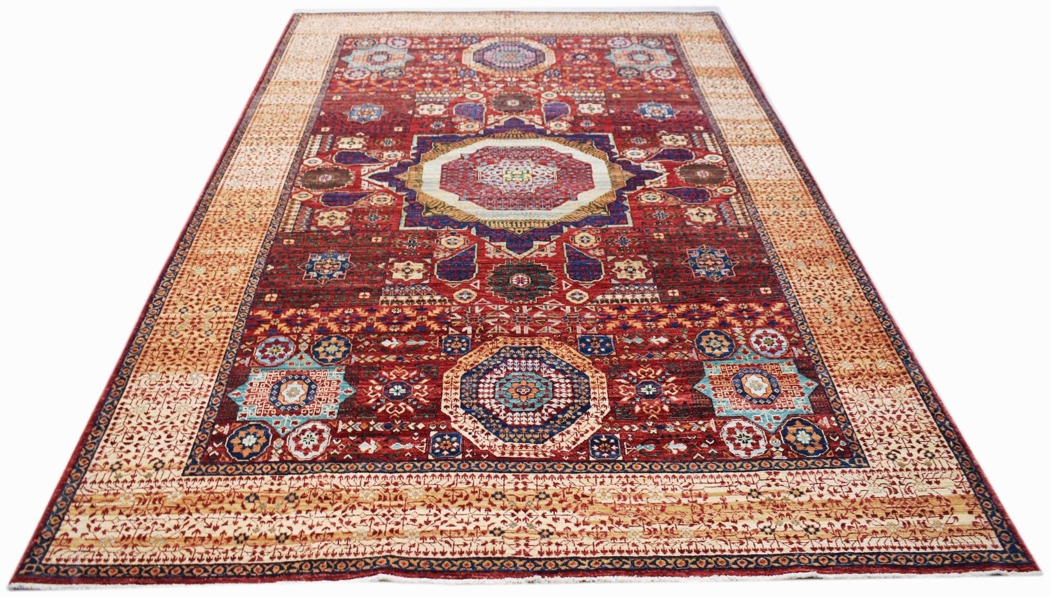 Handwoven Afghan Balkh rug featuring a traditional Mamluk medallion pattern in red and blue tones.