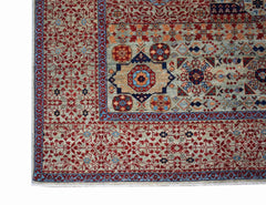 A handmade Afghan Balkh rug featuring a detailed Mamluk medallion pattern in red and blue tones.