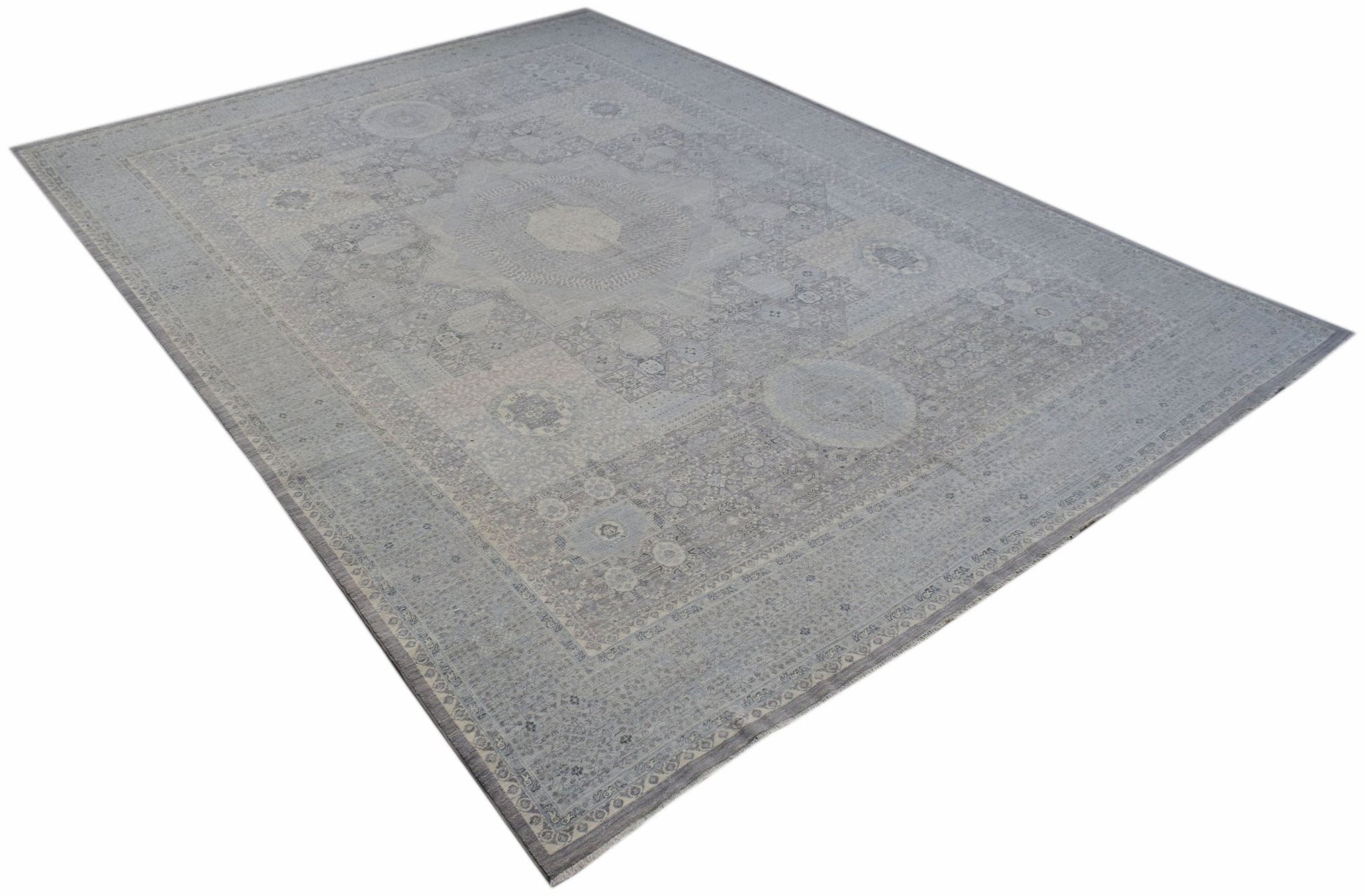 A handwoven Afghan Balkh rug featuring a detailed Mamluk medallion pattern in shades of grey.