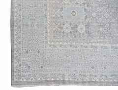 A handwoven Afghan Balkh rug featuring a traditional Mamluk medallion pattern in shades of blue.