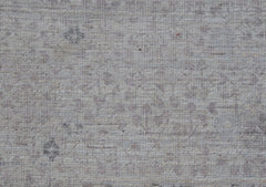 A close-up of a handwoven Afghan Balkh rug featuring a subtle, light-toned Mamluk pattern.