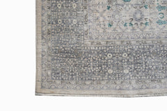 A handwoven Afghan Balkh rug featuring a detailed Mamluk pattern in shades of grey and blue.