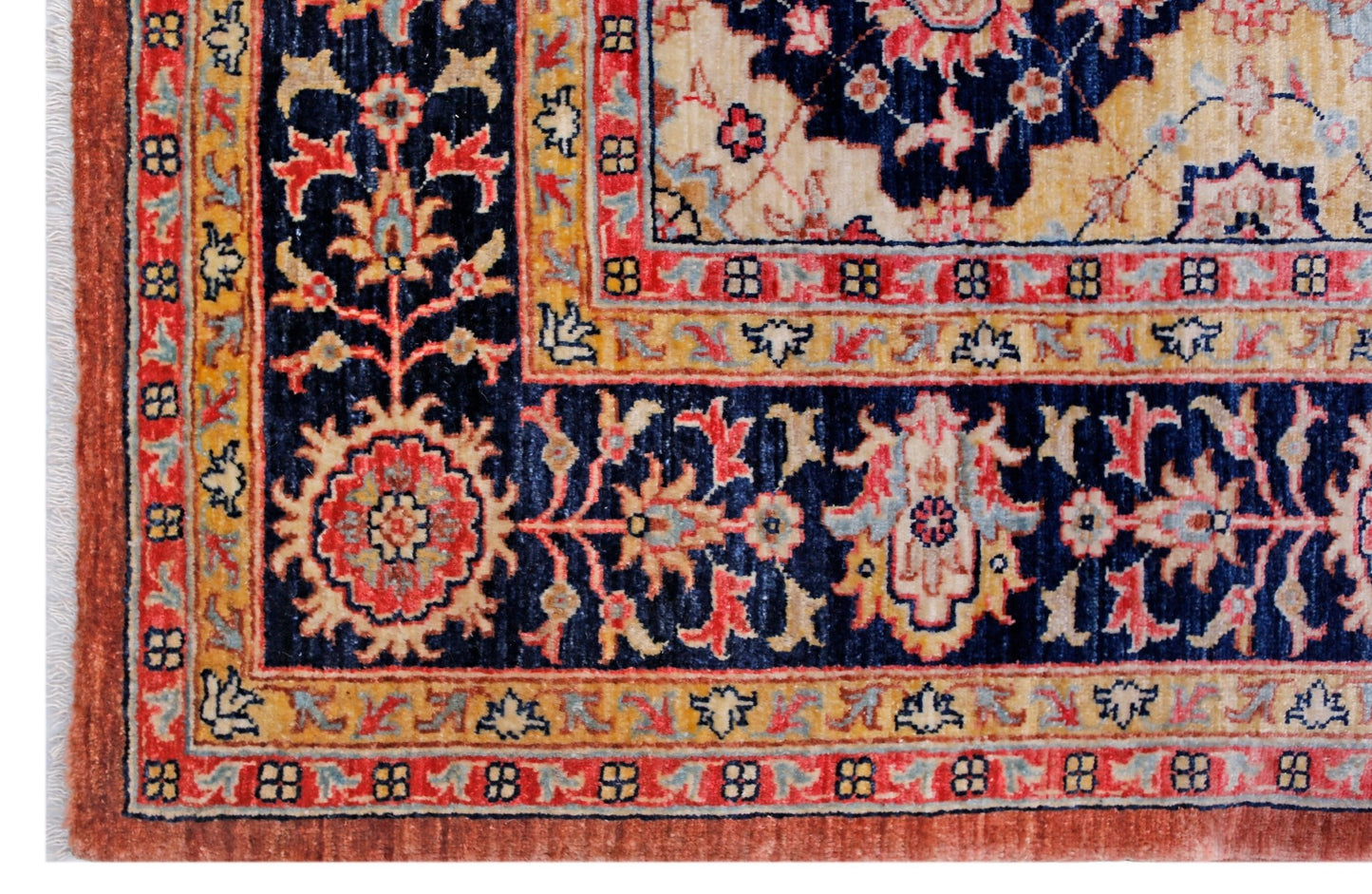 A handwoven Afghan Balkh rug featuring a traditional floral pattern in blue, red, and cream tones.