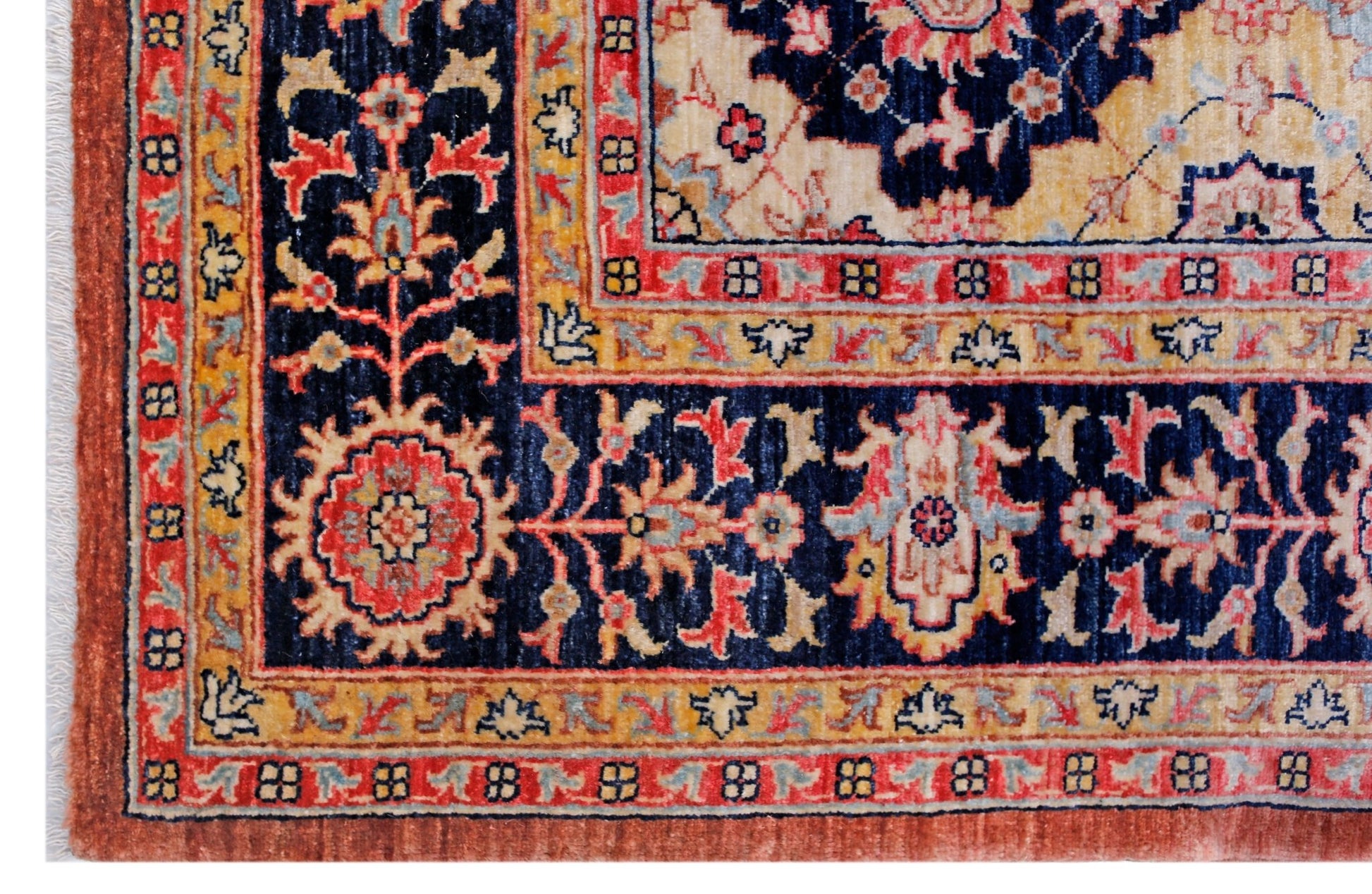 A handwoven Afghan Balkh rug featuring a traditional floral pattern in blue, red, and cream tones.