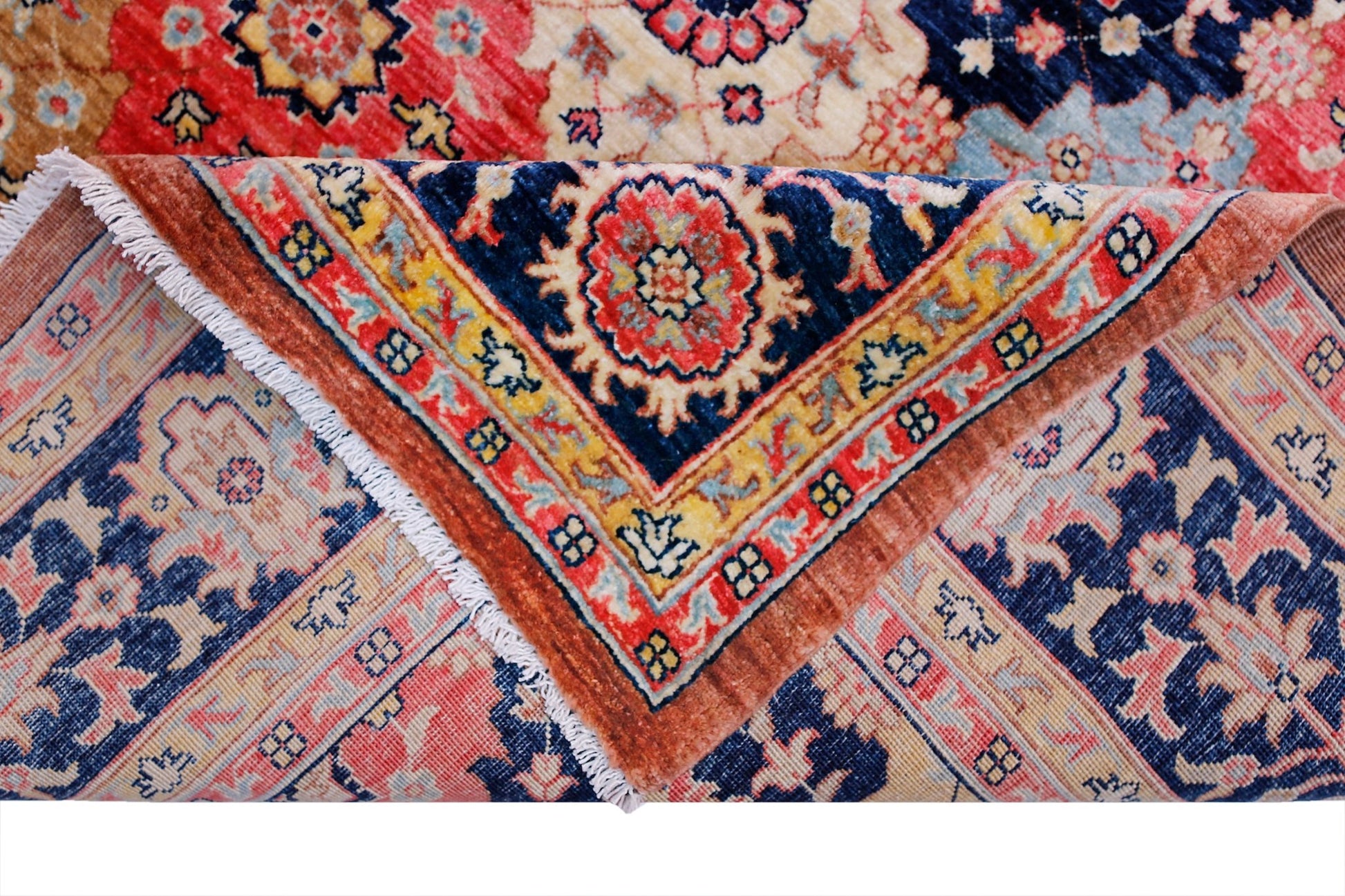 A handwoven Afghan Balkh rug featuring a traditional floral pattern in red, blue, and cream tones.
