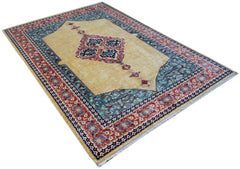 Handwoven Afghan Balkh rug featuring a central floral medallion on a beige field with blue borders.