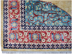Handwoven Afghan Balkh rug featuring a traditional floral pattern in red, blue, and gold tones.