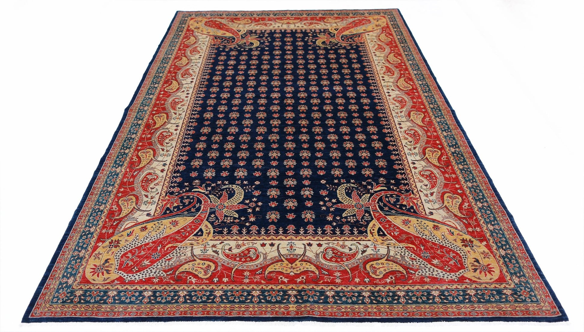 Handwoven Afghan Balkh rug featuring a dark blue field with floral motifs and red paisley borders.