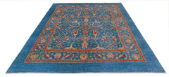 Handwoven Afghan Balkh rug featuring a traditional floral pattern in blue, red, and cream tones.