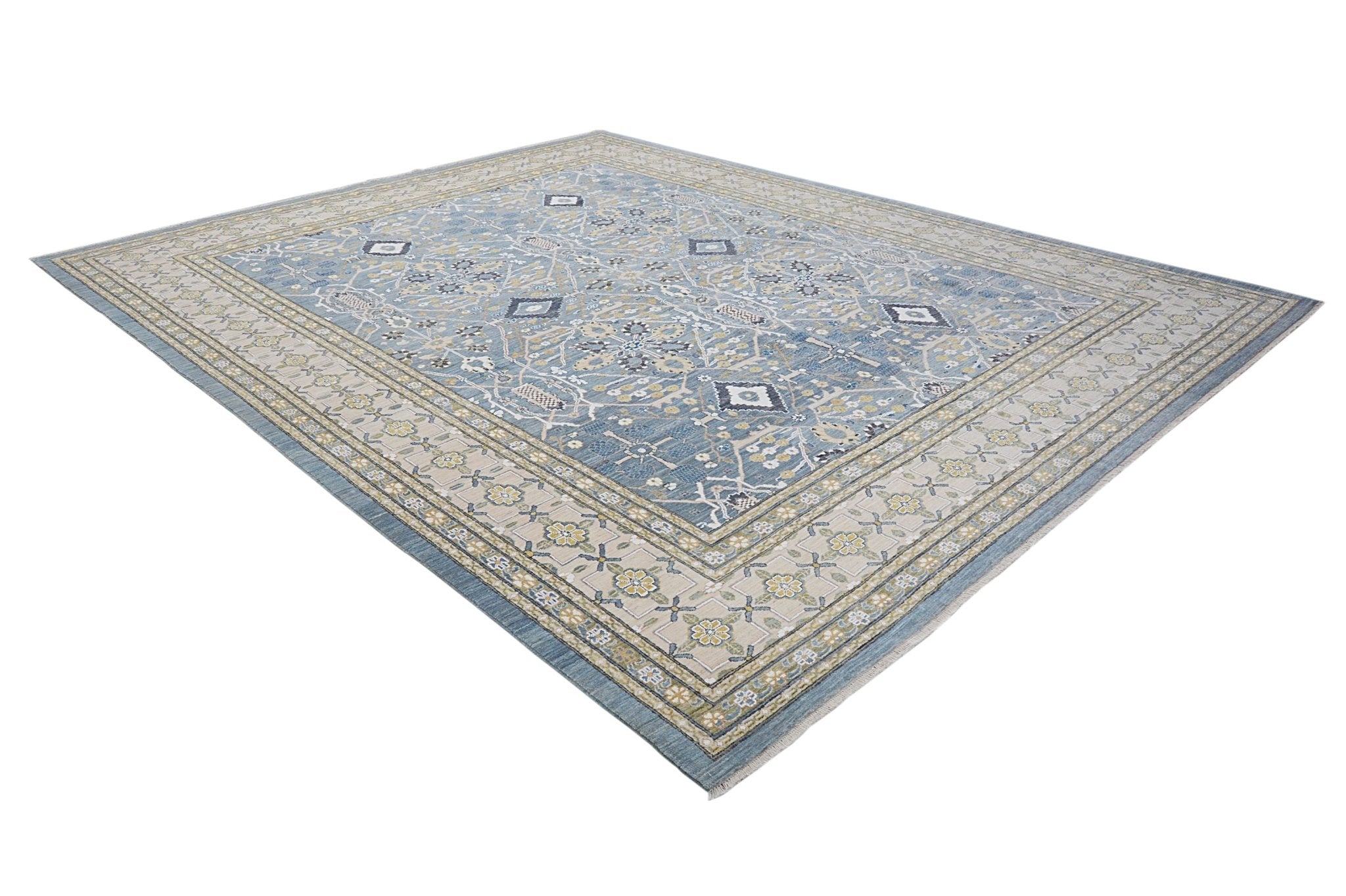 An Afghan Balkh rug featuring a traditional floral pattern in blue and beige tones.