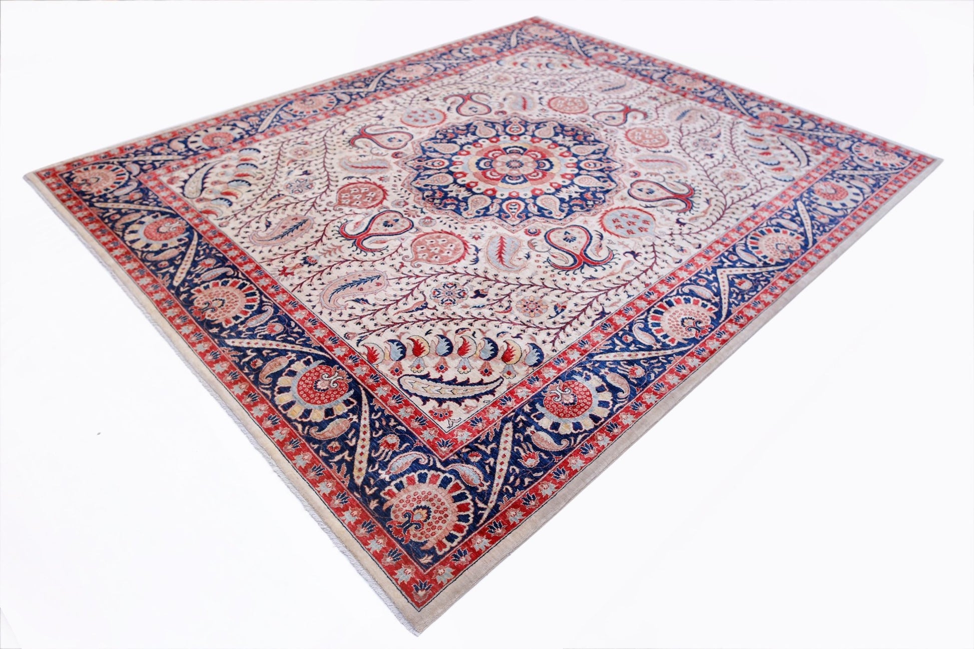 A rectangular Afghan Balkh rug featuring a central floral medallion on a cream field with blue borders.