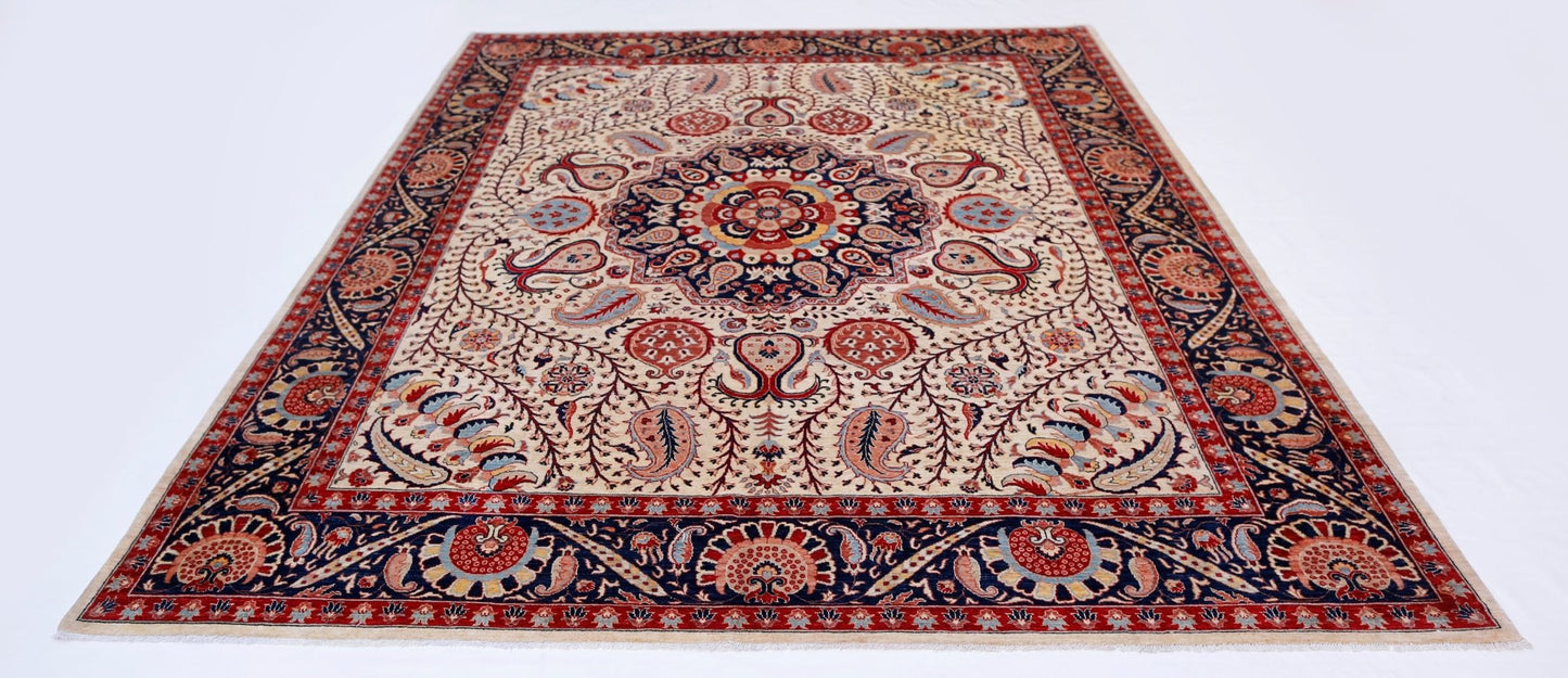 Handwoven Afghan Balkh rug featuring a traditional floral medallion pattern in red and blue tones.