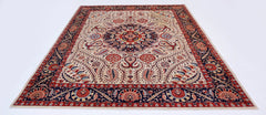Handwoven Afghan Balkh rug featuring a traditional floral medallion pattern in red and blue tones.