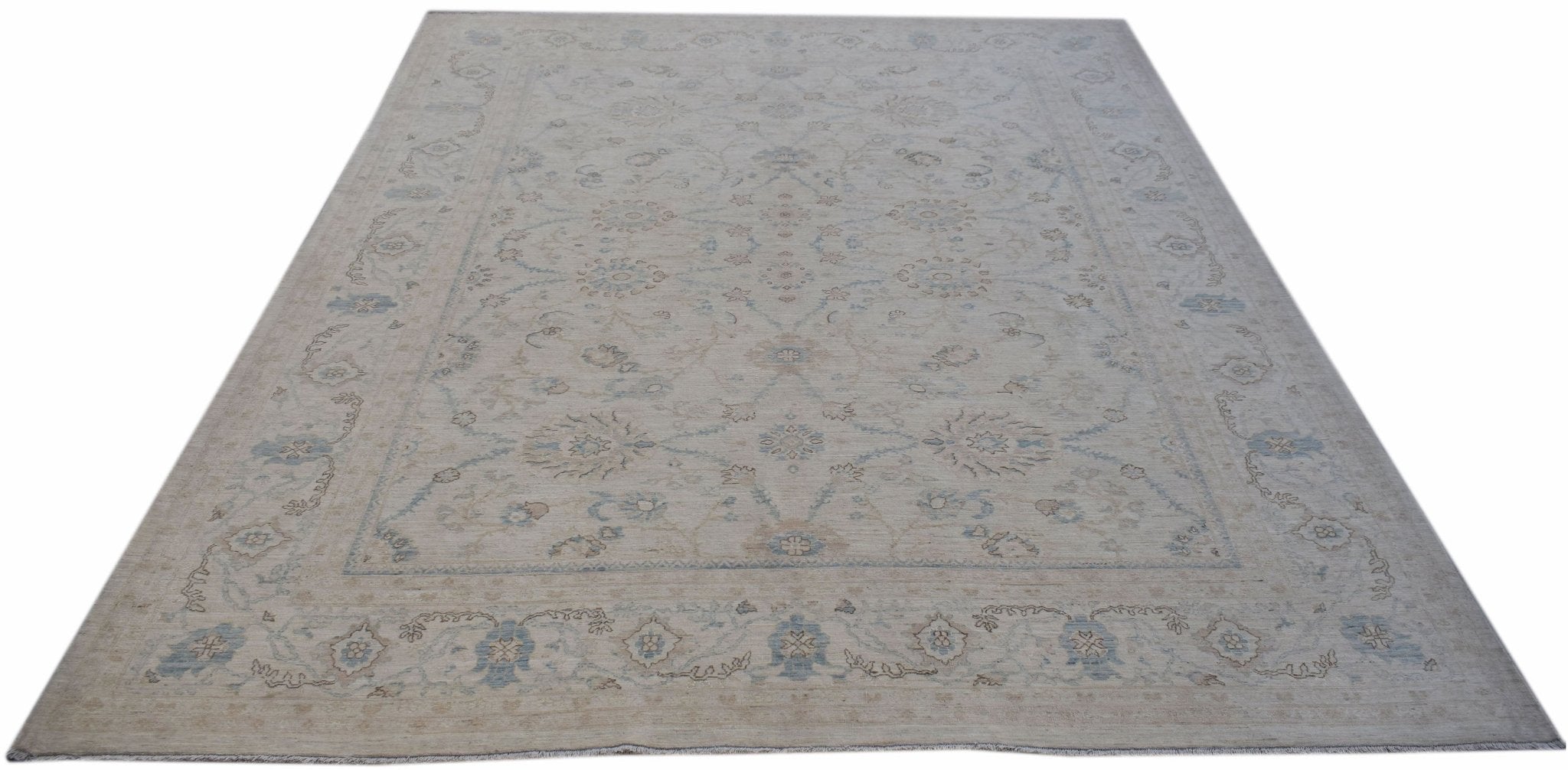 Handwoven Afghan Balkh rug featuring a traditional floral pattern in soft blue and beige tones.