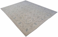 An Afghan Balkh rug featuring a traditional floral pattern in soft beige and blue tones.