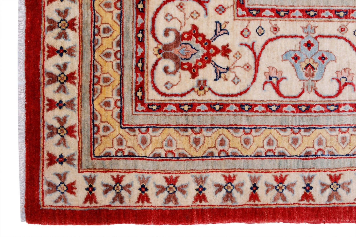A handwoven Afghan Balkh rug featuring a traditional floral pattern in red, cream, and gold tones.