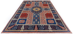 An Afghan Balkh rug featuring a traditional geometric pattern in shades of blue, red, and gold.