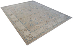 Handwoven Afghan Balkh rug featuring a traditional floral pattern in soft beige and blue tones.