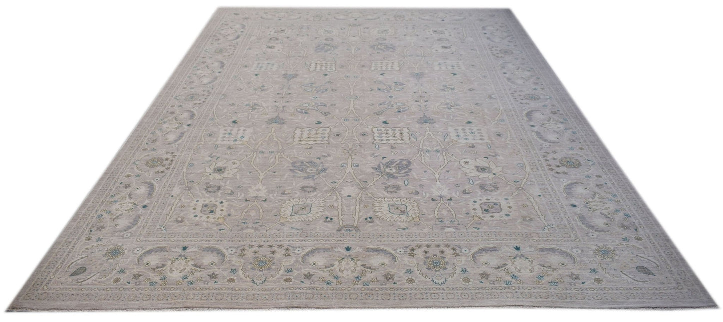 A handwoven Afghan Balkh rug featuring a traditional floral pattern in soft neutral tones.