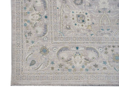 A handwoven Afghan Balkh rug featuring traditional floral patterns in soft neutral tones.