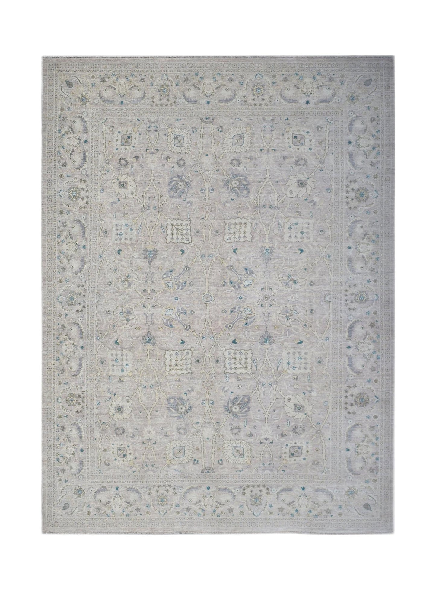 Handwoven Afghan Balkh rug featuring a traditional floral pattern in soft neutral tones.