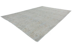 An Afghan Balkh rug featuring a light blue field with a traditional floral pattern in beige.