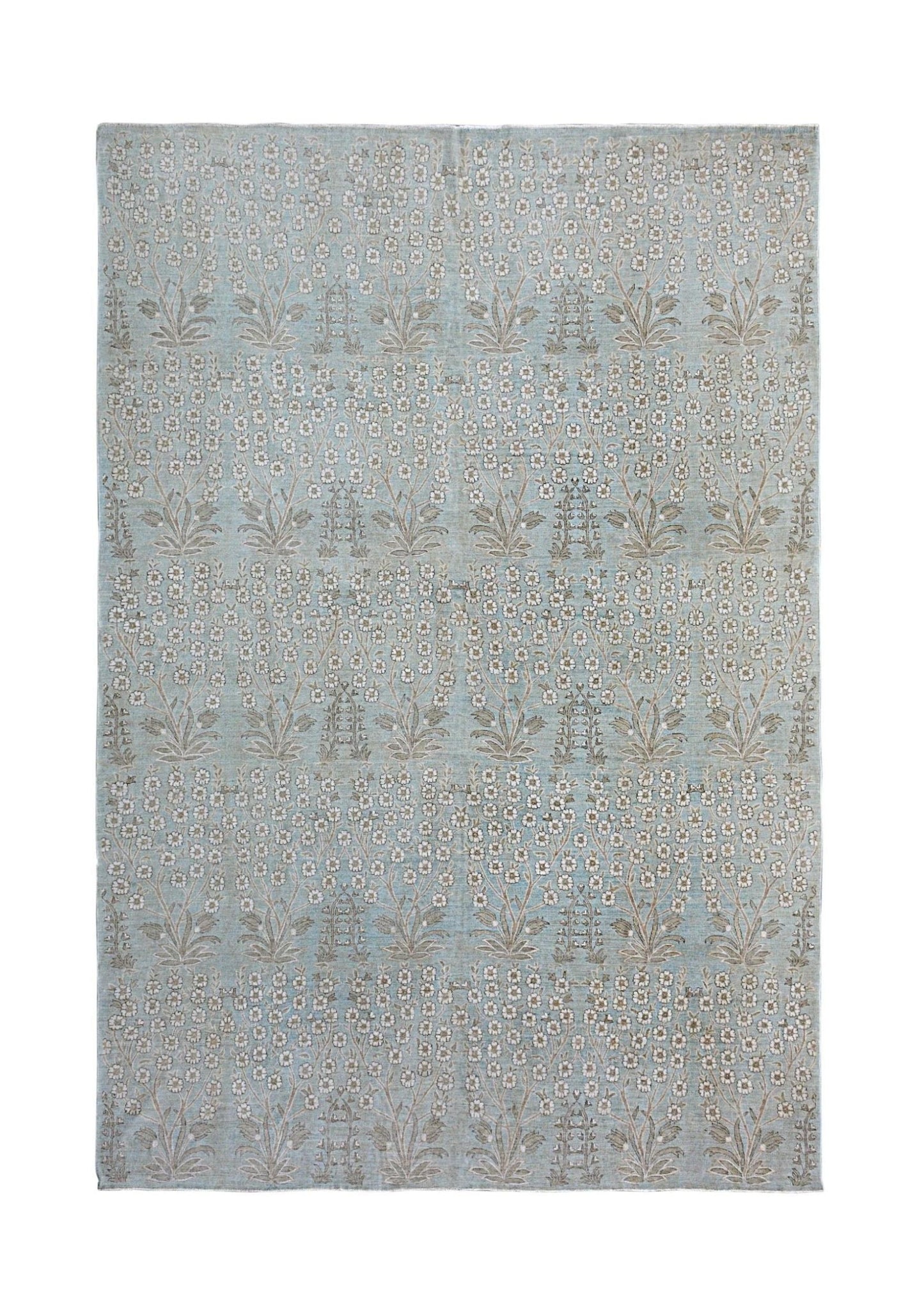 A handmade Afghan Balkh rug featuring a repeating floral pattern in soft blue and neutral tones.