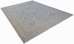 A rectangular Afghan Balkh rug featuring a traditional blue and beige geometric pattern.