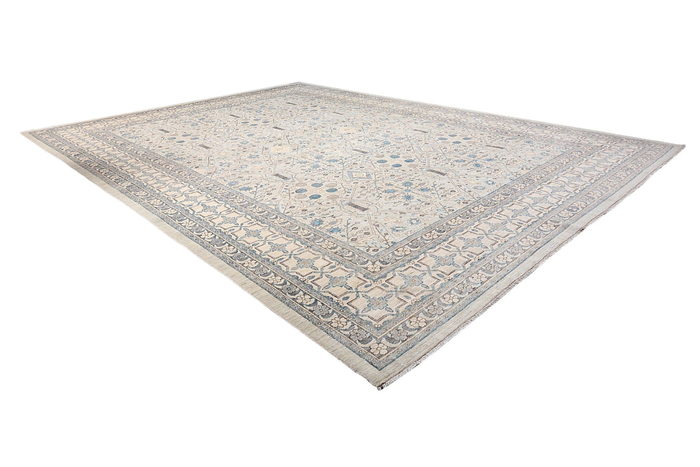An Afghan Balkh rug featuring a traditional floral pattern in soft blue and beige tones.