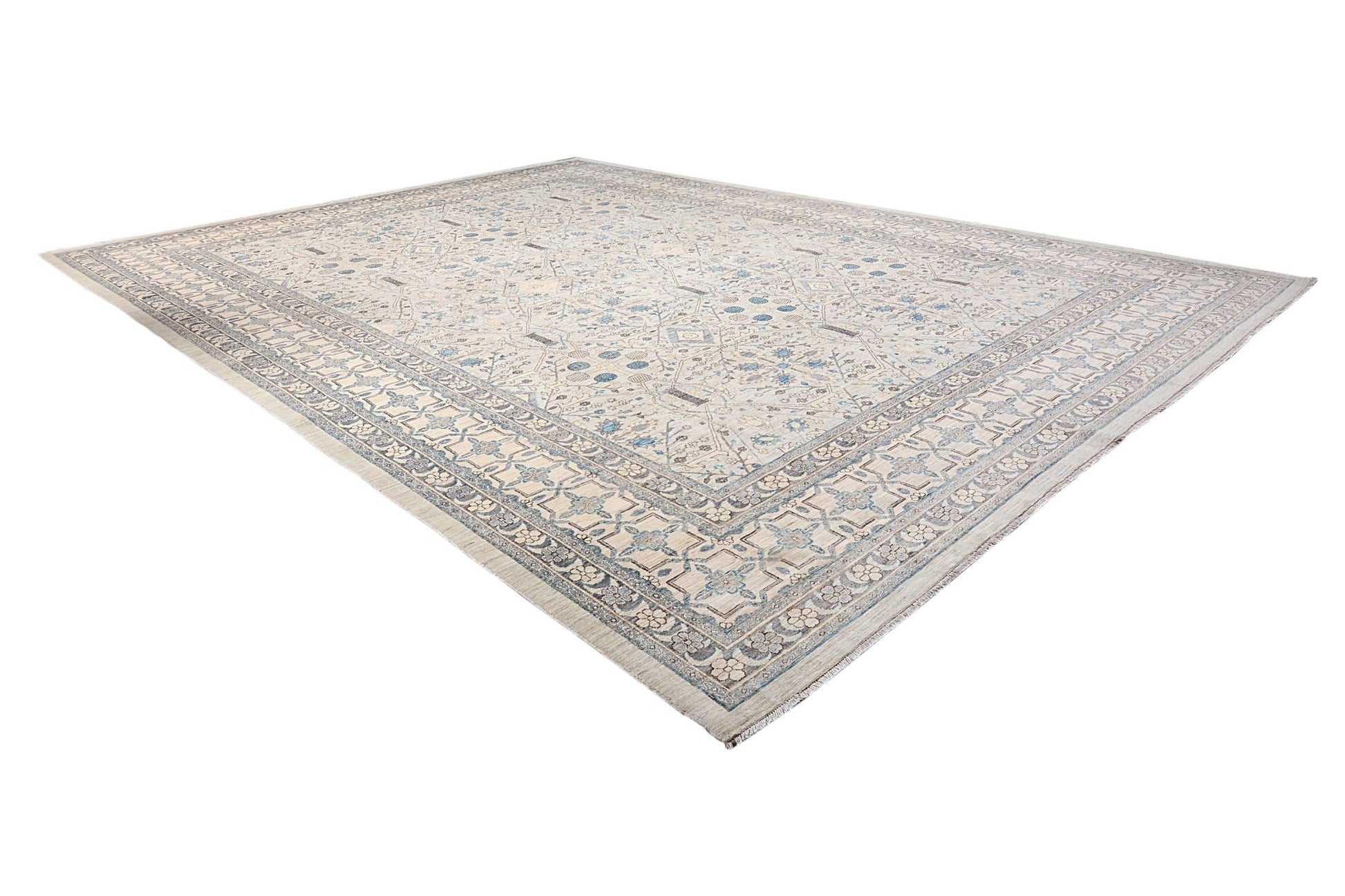 An Afghan Balkh rug featuring a traditional floral pattern in soft blue and beige tones.