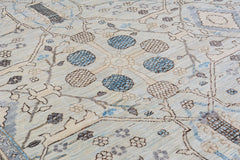 An Afghan Balkh rug featuring a traditional floral pattern in shades of blue and beige.