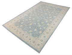 A handmade Afghan Balkh rug featuring a traditional floral pattern in shades of blue and cream.