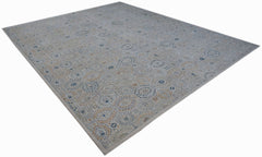 An Afghan Balkh rug featuring a traditional floral pattern in soft blue and beige tones.