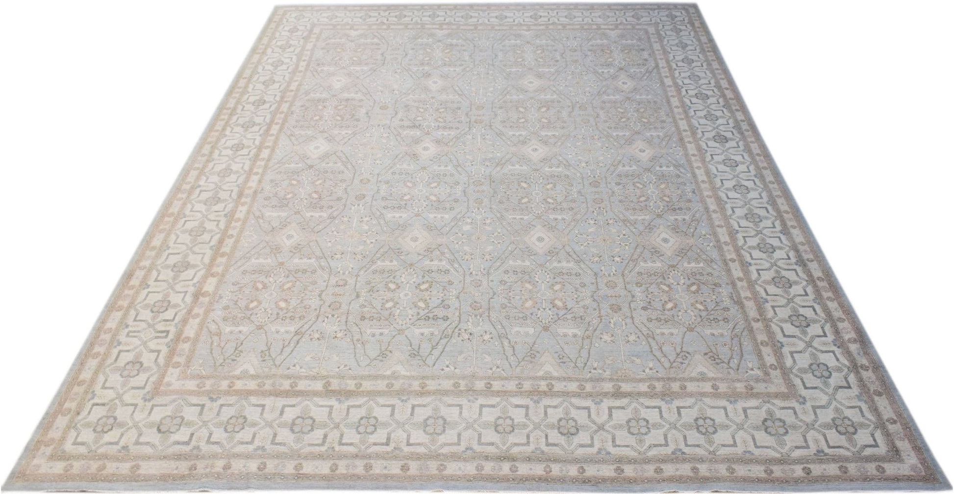 A large, rectangular Afghan Balkh rug featuring a traditional light blue and beige floral pattern.