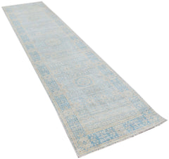 A handwoven Afghan Chobi runner rug featuring a light blue and cream Mamluk medallion pattern.