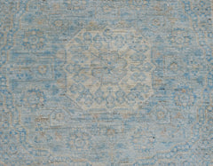 A handwoven Afghan Chobi runner featuring a detailed Mamluk medallion pattern in blue and cream.