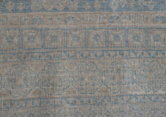 A handwoven Afghan Chobi runner featuring a traditional blue and beige Mamluk geometric pattern.