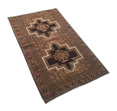 Handmade Afghan Baluch rug featuring two dark brown geometric medallions on a brown wool field.