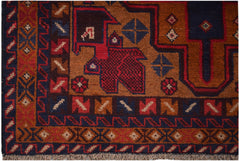 A handmade Afghan Baluch rug featuring geometric tribal patterns in deep red, brown, and blue tones.
