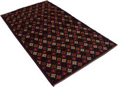 Handmade Afghan Baluch rug featuring a repeating geometric pattern in dark red, brown, and blue.