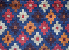 Handmade Afghan Baluch rug featuring a repeating geometric pattern in red, orange, and ivory.