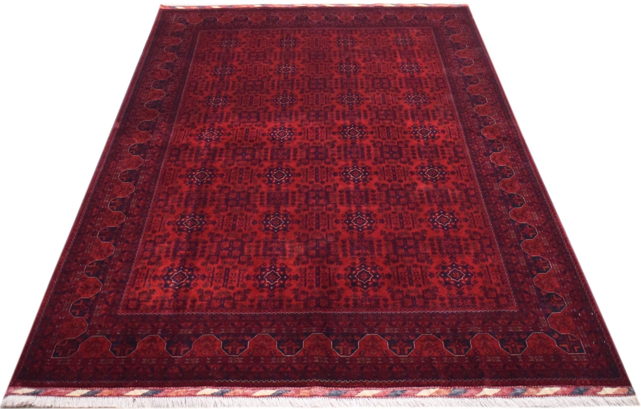 A handmade Afghan Biljik rug featuring a deep red field with intricate blue geometric patterns.