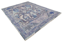 A handwoven Afghan Chobi rug featuring traditional Bidjar patterns in shades of blue and grey.