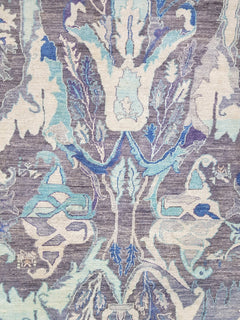 Handwoven Afghan Chobi rug featuring a traditional Bidjar pattern in shades of blue and grey.