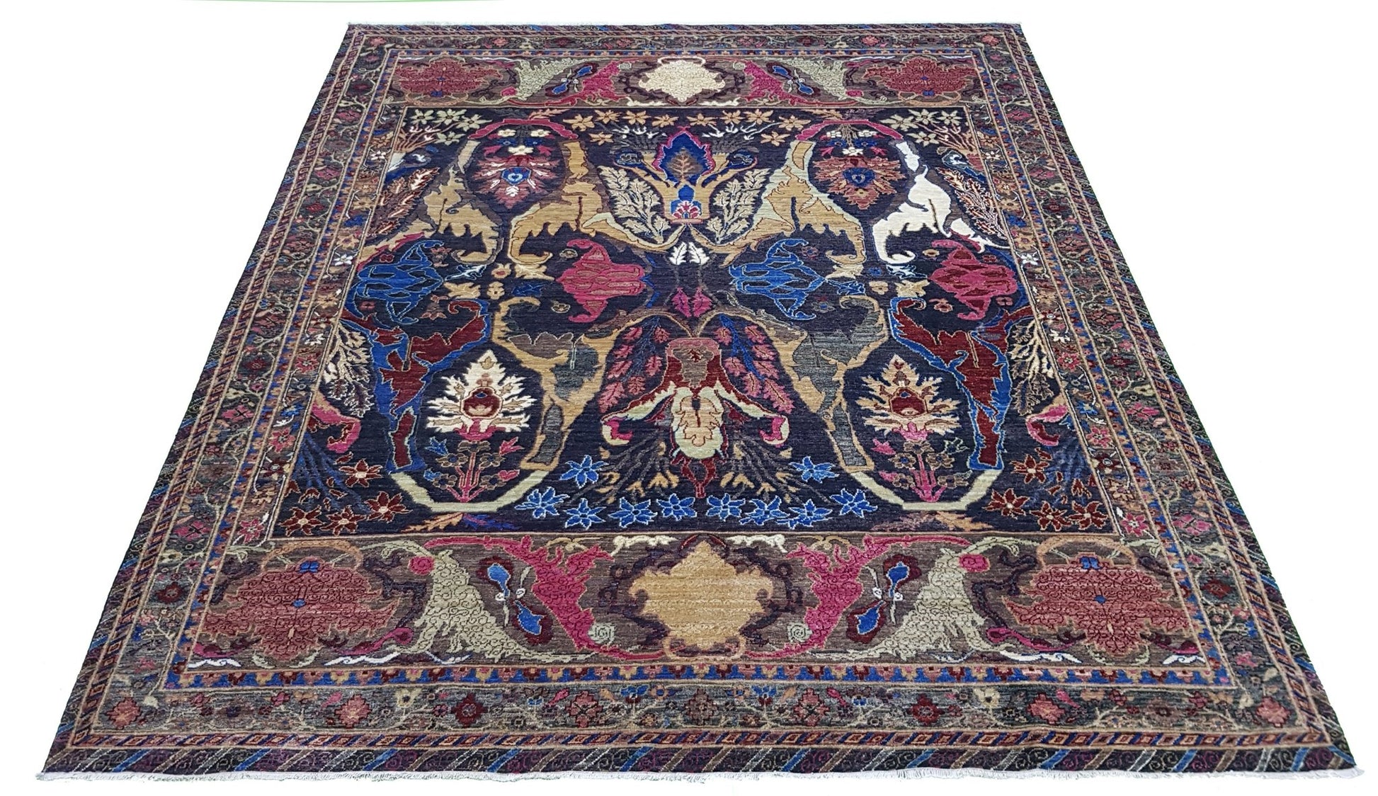 A rectangular Afghan Chobi rug featuring a traditional Bidjar pattern in deep blue and pink tones.