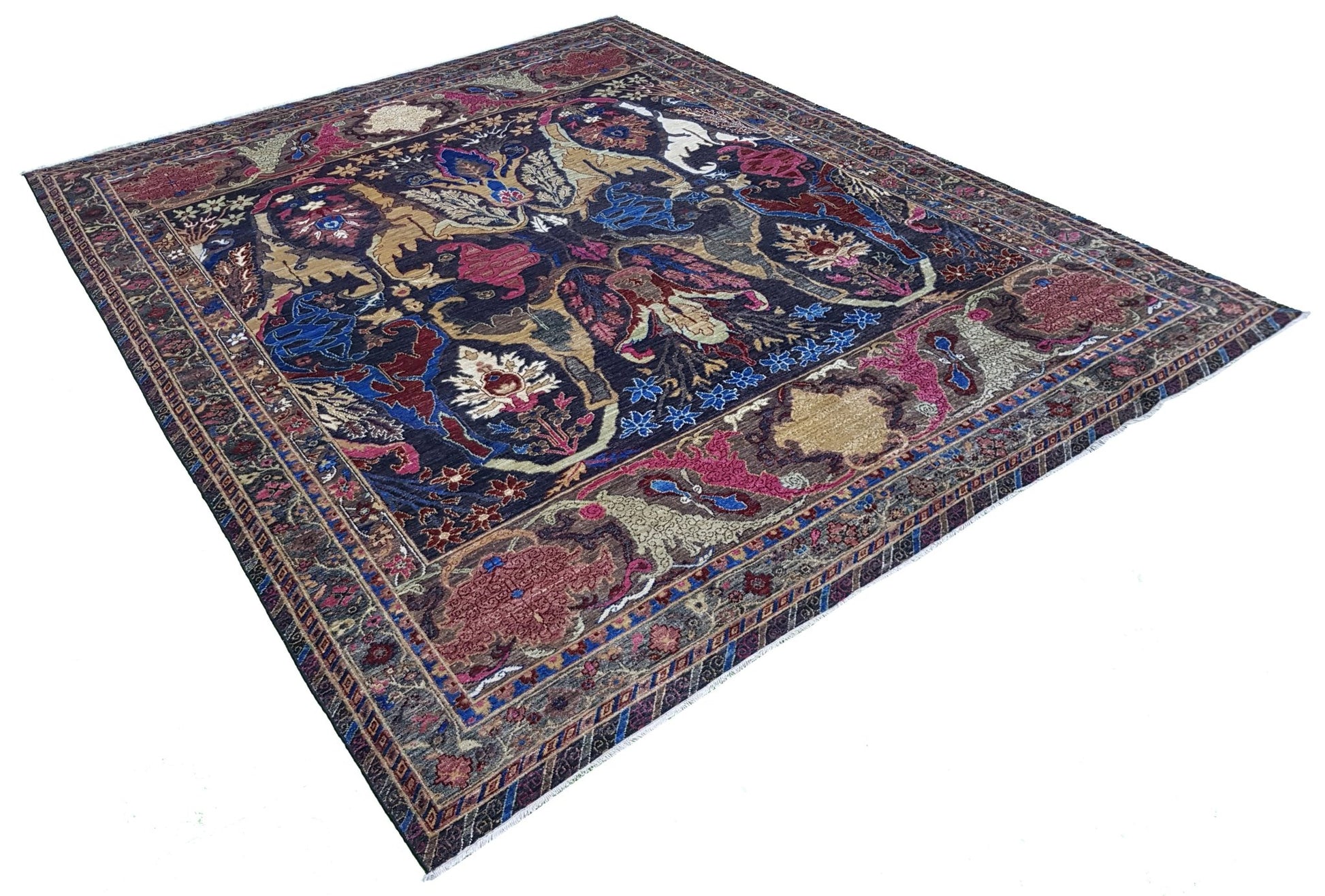 A handwoven Afghan Chobi rug featuring a traditional Bidjar pattern in deep blue and red tones.